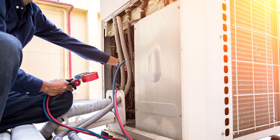 technician checking commercial unit