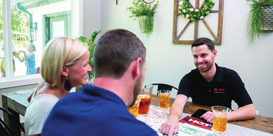 technician talking with customers